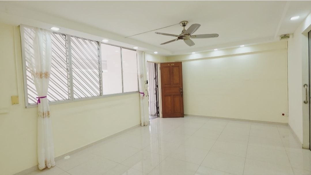 Corner HDB unit at 207 Serangoon Central with bright living and dining hall — image 7